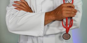 frontline worker holding stethoscope.jpg