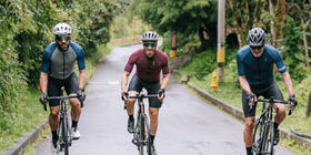 three men cycling on a forest road thumbnail.png