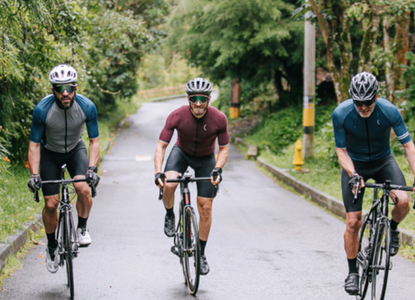 three men cycling on a forest road thumbnail.png